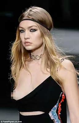 Gigi Hadid Suffers Nip Slip As She Models Versace Photos
