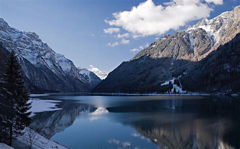 Panoramic Photography Of Mountain Coated Snow And Lake During Daytime