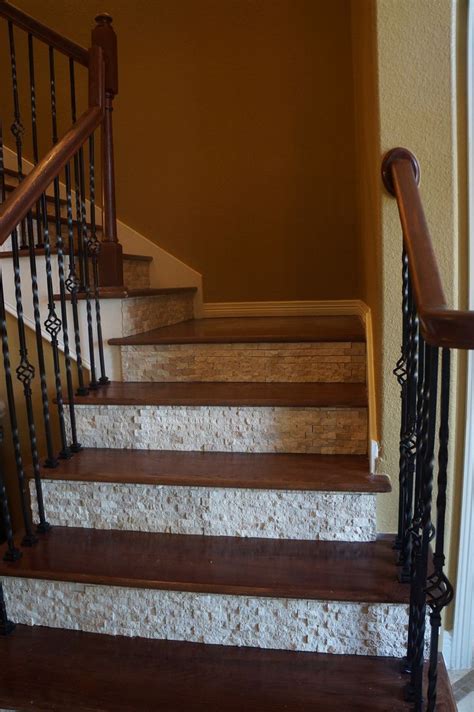 Below are 10 beautiful tiled stairs designs for your house. splitface tile on stair risers | THE WOODLANDS DESIGN FIRM ...