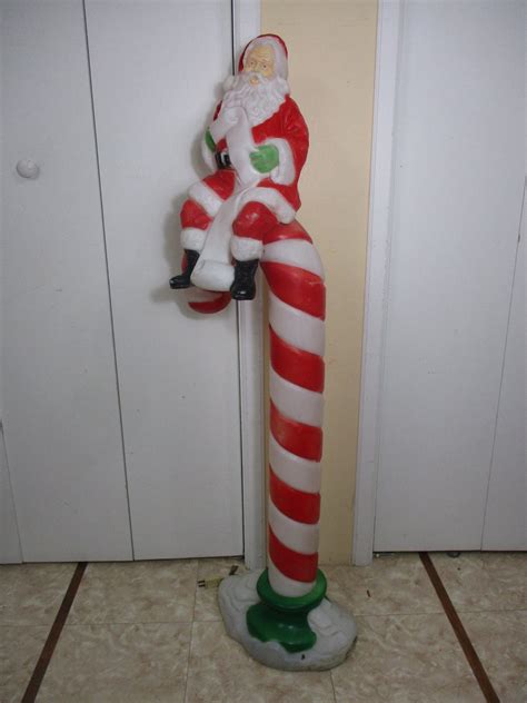 Vintage Santa Claus On Candy Cane Lighted Christmas Blow Mold Décor 50