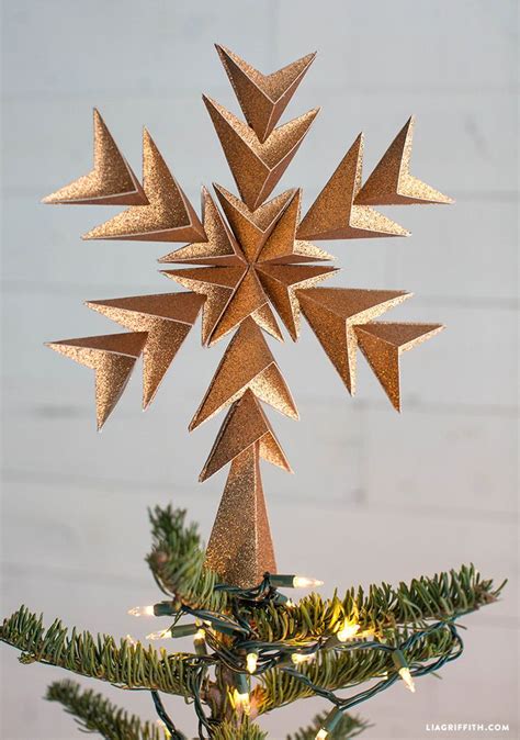 Homemade christmas tree star topper. How to Make Your Own Glitter Paper Star Tree Topper - Lia ...