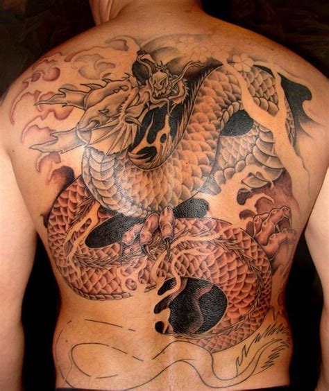 Flying bird and still bird lovely songbird tattoo! Asian Songbird Tattoo. Meaning And Pictures Of Swallow ...
