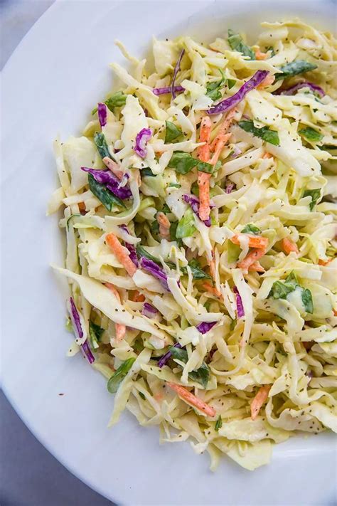 Close Up Of Classic Homemade Coleslaw On A White Plate Best Coleslaw
