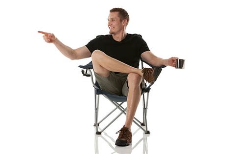 Royalty Free Sitting Cross Legged Folding Chair Legs Crossed At Knee