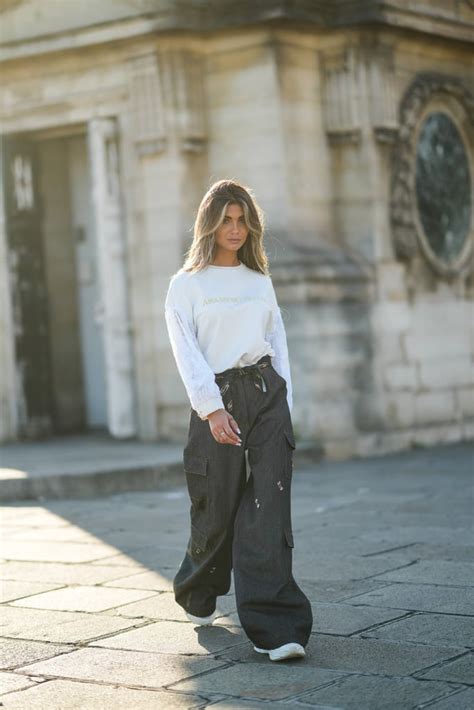 wide leg pants outfit with a sweater and sneakers how to wear wide leg pants popsugar