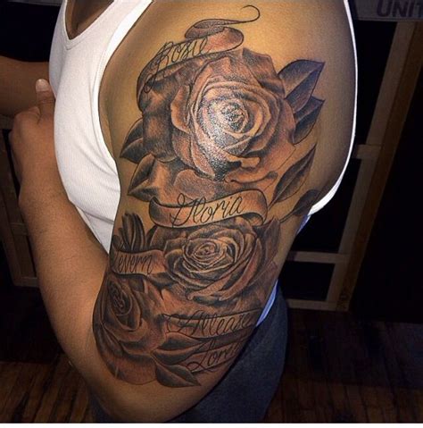 #blackandgreyink #rosetattoo #armsleevetattoo #lockettattoo #starrtattoosupplies. Half sleeve Roses tattoo with name banners. Done by ...