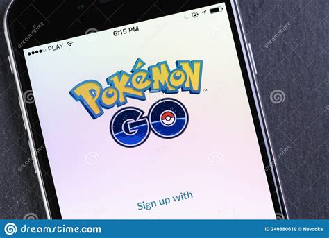 Mobile Phone With Popular Game Pokemon Go Running On Screen Editorial
