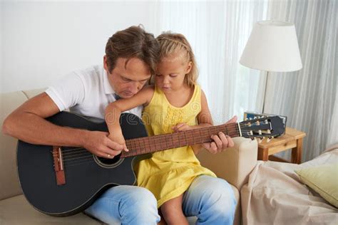 Father And Daughter Playing Guitar Stock Photo Image Of Small