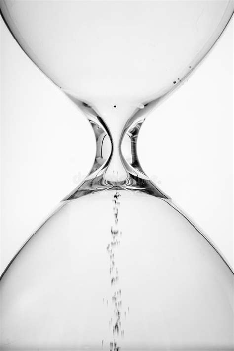 Hourglass With Flowing Sand On Tableo Time Management Stock Image Image Of Efficiency Object