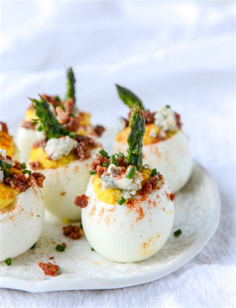 Got extra eggs on hand? Bacon Blue Deviled Eggs with Roasted Garlic and Asparagus