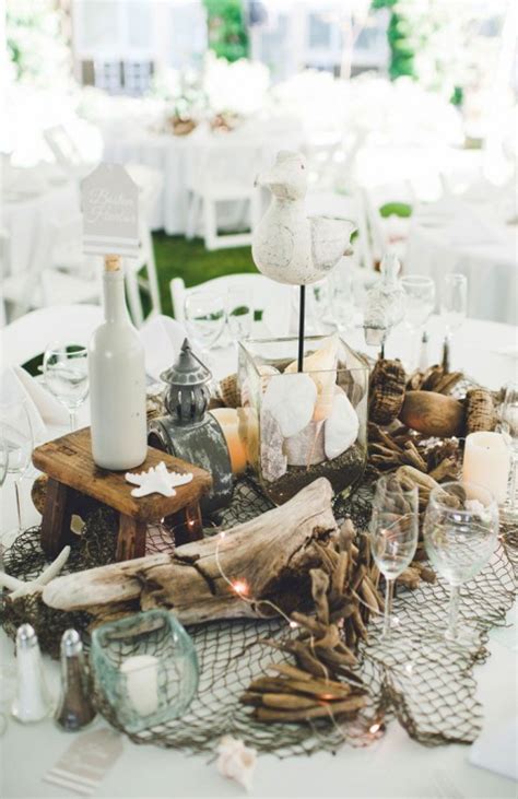 The table centerpiece ideas shown in the pictures below, demonstrate the colours and motifs of the sea. 36 Amazing Beach Wedding Centerpieces | Deer Pearl Flowers