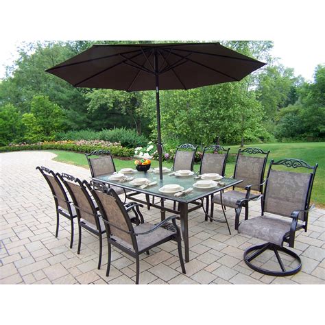 Summer classics offers an umbrella with custom shade fabric and a heavy wrought iron base. Oakland Living Cascade Patio Dining Set with Umbrella and ...