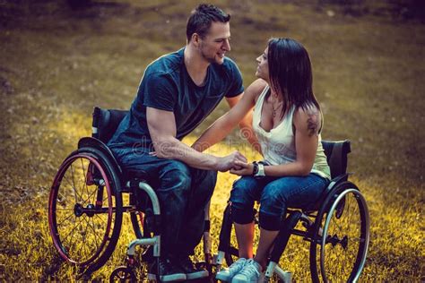 Handicapped Young Couple On Two Wheelchairs Stock Image Image Of