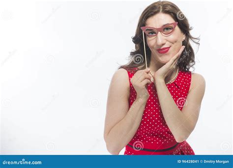 Portrait Of Cute And Sensual Caucasian Brunette Girl Holding Artistic Spectacles Stock Image
