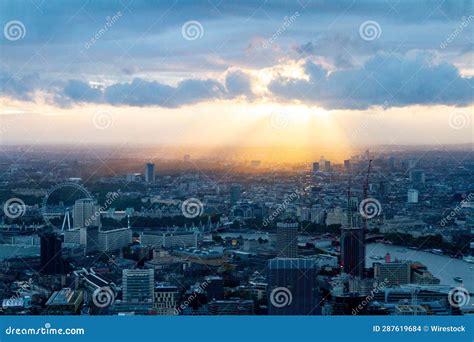 Stunning Aerial View Of A Vibrant Sunset Over The Iconic City Of London