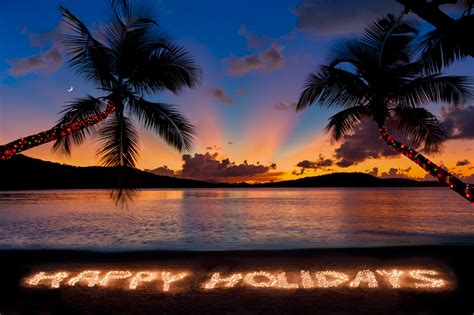 Happy Holidays Made With Christmas Lights At A Tropical Beach
