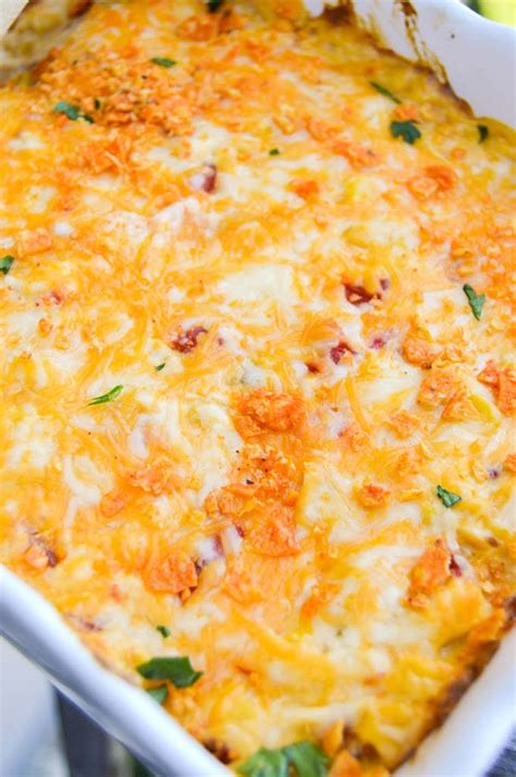 Mix your cooked and shredded chicken, cream of chicken soup, sour cream, drained rotel, drained corn, and 1 cup of your. Creamy Cheesy Dorito Chicken Casserole | YellowBlissRoad.com
