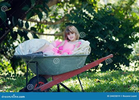 Little Girl In Wheelbarrow Stock Image Image Of Garden 24425819