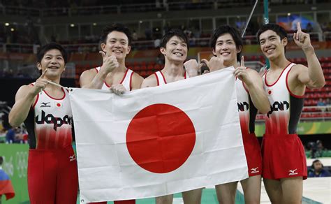 japan men s gymnastics team strikes gold over russia china the japan times