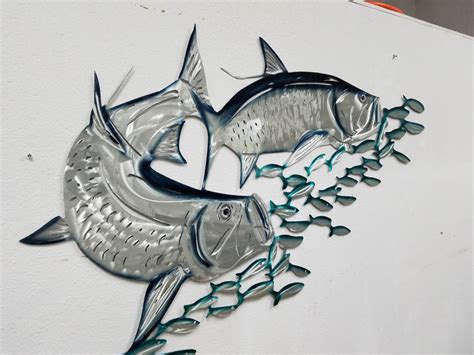 The metal wall art large sea turtle is a great looking piece of metal wall decor and a fantastic addition to any home decor or outdoor yard decor collection. Tarpon Metal Wall Art, Aluminum Metal Fish Art, Metal ...