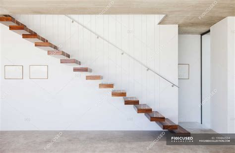Side View Of Floating Staircase In Modern House — Architecture