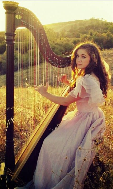 Playing Harp In A Field Of Gold Musician Portraits Harp Elegant