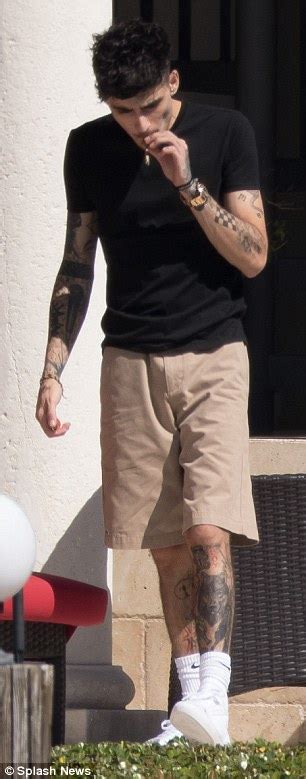 shirtless zayn malik shows off his heavily inked torso daily mail online