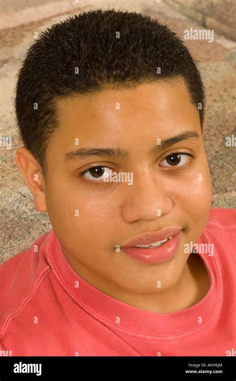 15 Year Old Teenage Boy At Home Portrait Closeup Vertical Hispanic
