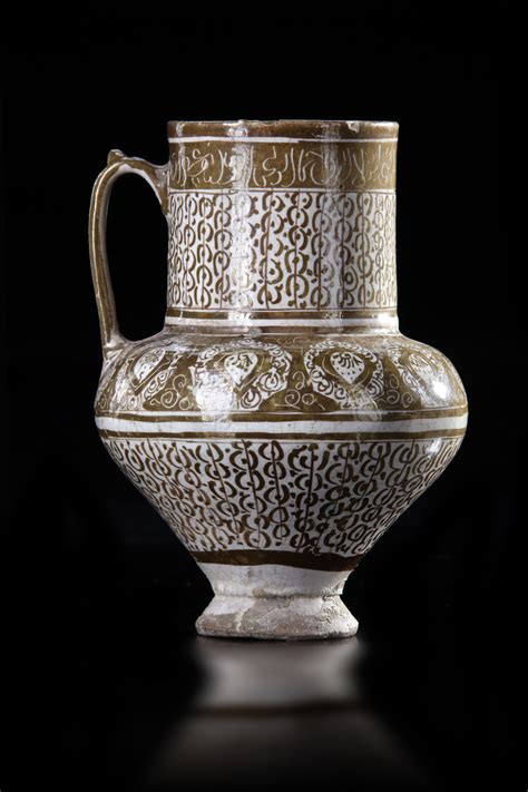 a kashan lustre pottery jug persia 13th century