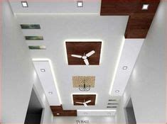 In the centre of the ceiling, a recession is created to hold the two small fans, which almost seem to blend. Best Gypsum Board False Ceiling Design For Hall And ...
