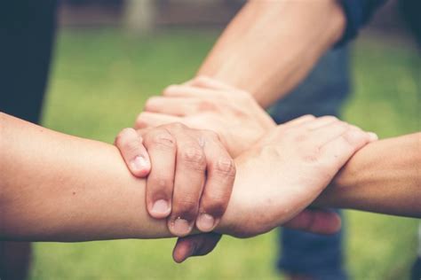 Premium Photo Hands Holding Trust Each Other With Success Partnership