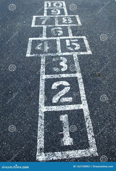 Hopscotch Game On Pavement At Elementary School Stock Photo Image Of