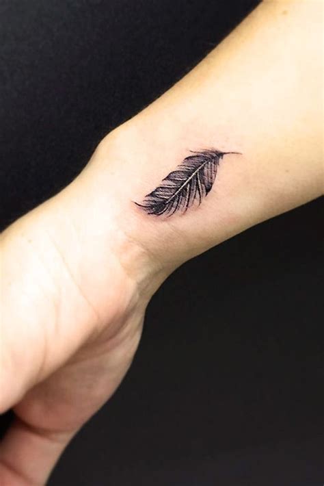 53 Delicate Wrist Tattoos For Your Upcoming Ink Session Feather