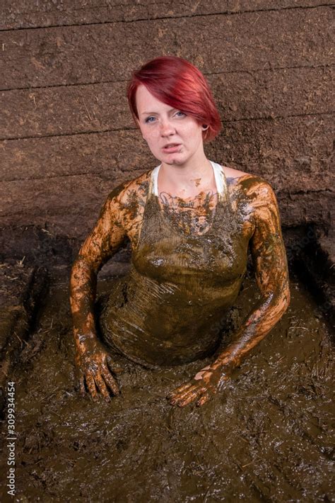 Girl Bathing In Cow Manure In A Manure Channel Stock Photo Adobe Stock