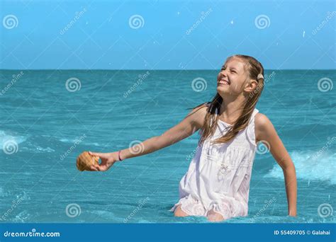 Girl Sitting In Sea Water On The Beach Stock Image Image Of Sand Calm 55409705