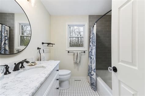 This wonderful bathroom from ashley montgomery design is the perfect combination of modern and trendy. Timeless and Traditional Bathroom - Rhode Kitchen & Bath ...