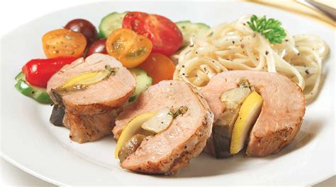 Pork tenderloin stuffed with caramelized onions and apples. Artichoke-Stuffed Nagano Pork Tenderloin | IGA Recipes