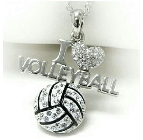 A Volleyball Necklace With I Love Volleyball Written On The Front And