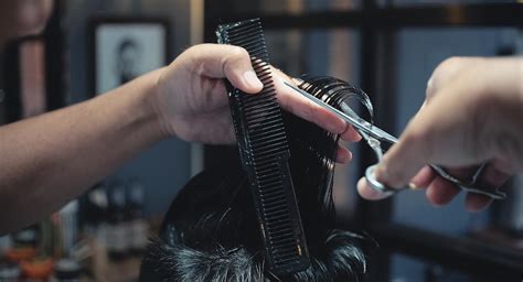 Directly in front of the area you are cutting. Mens' Haircuts at Home: Everything You Ever Needed to Know