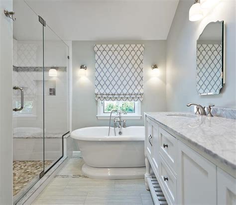 We chose to top off our mosaic tile with a rounded tile border known as pencil molding. His and Hers Parisian Pedestal Sinks - Transitional - Bathroom