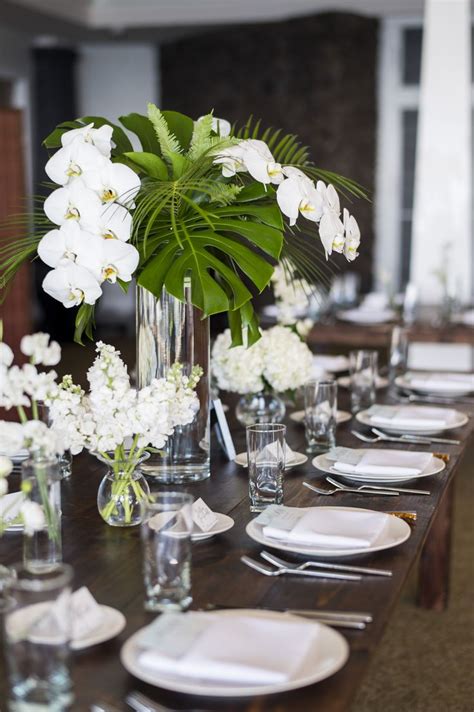 Wedding Centerpieces White Phaelaenopsis Orchids Monstera Leaves