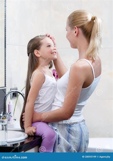 mom and daughter are in bathroom royalty free stock images image 28593199