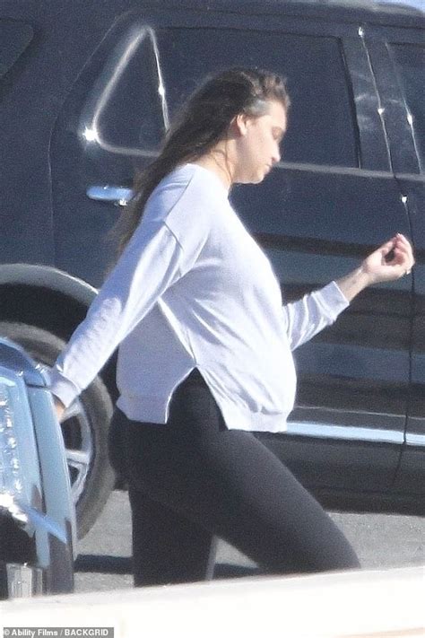 April Love Geary Shows Off Her Blossoming Bump In Sweats As She Enjoys A Beach Day Daily Mail