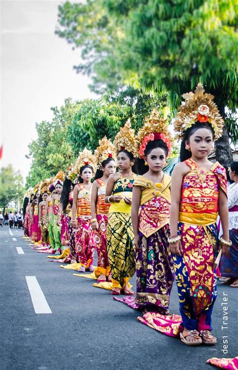 Apsara Watching Hindu Temple Festival Parade In Bali Indonesia