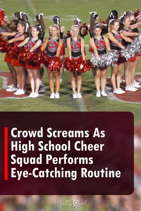 Crowd Screams As High School Cheer Squad Performs Eye Catching Routine