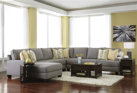 The gray area rug and marble top coffee table foster a look of cohesion. Living Room Ideas with Sectionals Sofa for Small Living ...