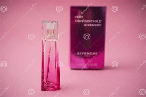 Givenchy Irresistible Perfume In Pink Bottle On Pink Background