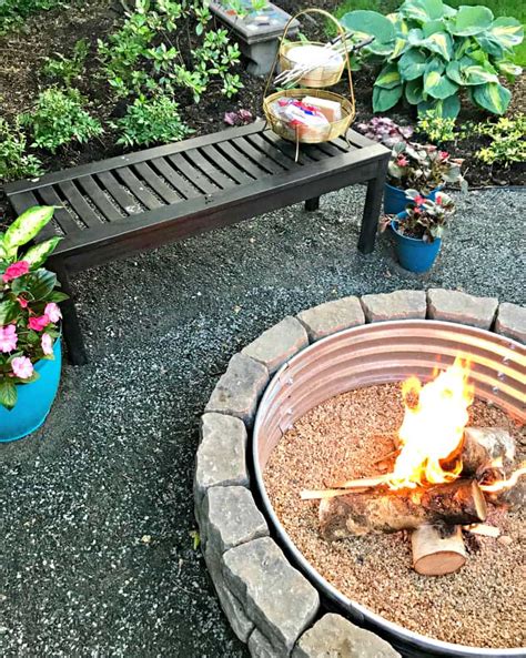 Using a level, make sure the bricks are relatively even all the way around. How to Build a Backyard Fire Pit - Average But Inspired