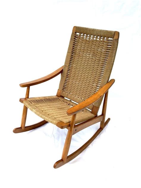 Dark wood with gold fruit painted at the head rest. Hans Wegner Danish Modern Mid Century Rope Rocking Chair ...