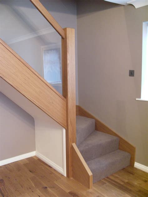 Staircase banisters and balustrades @ west midlands supply and fit. Glass & oak - N E Stairs Ltd